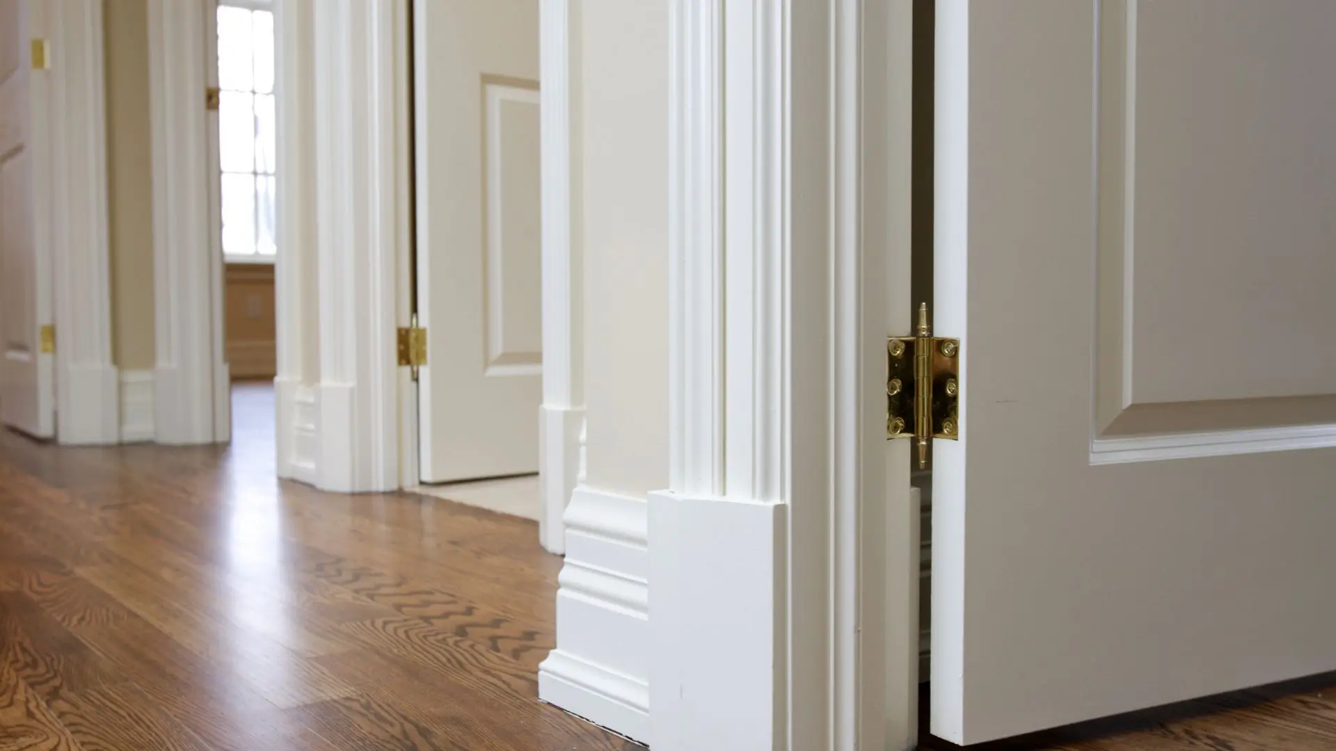 Door casing and baseboard molding profiles showing trim styles for interior finish work